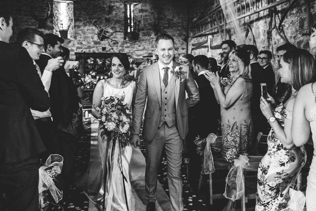 001 BLACK AND WHITE WEDDING PHOTOGRAPH OF JUST MARRIED COUPLE BARN CEREMONY USK CASTLE WEDDING